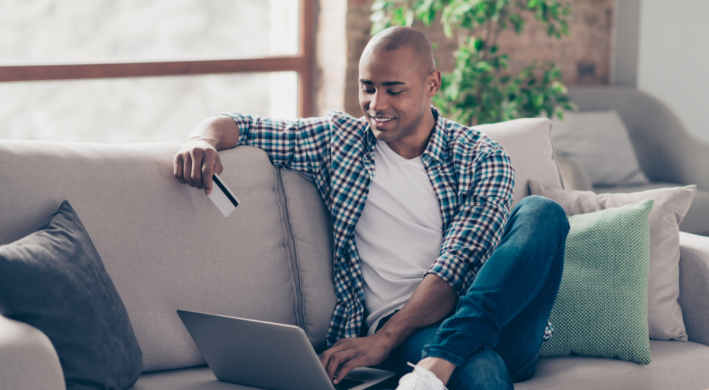 man-using-credit-card-online