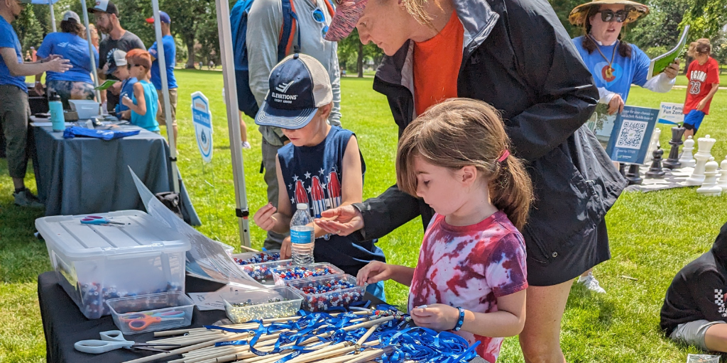 independence day celebration crafts table at the elevations credit union tent in fort collins colorado